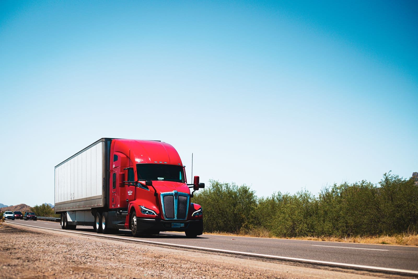 A semi-truck on an open highway